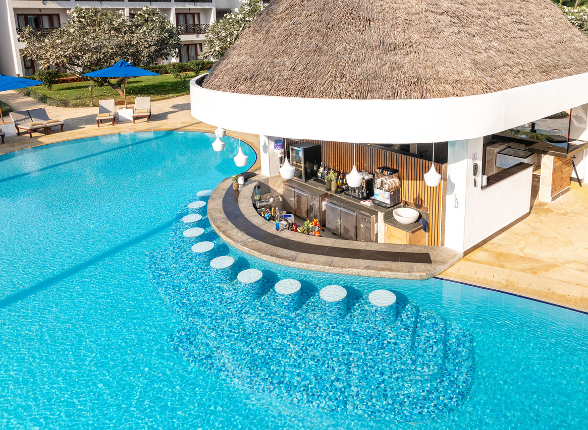 Área exterior do Nungwi Beach Resort by Turaco